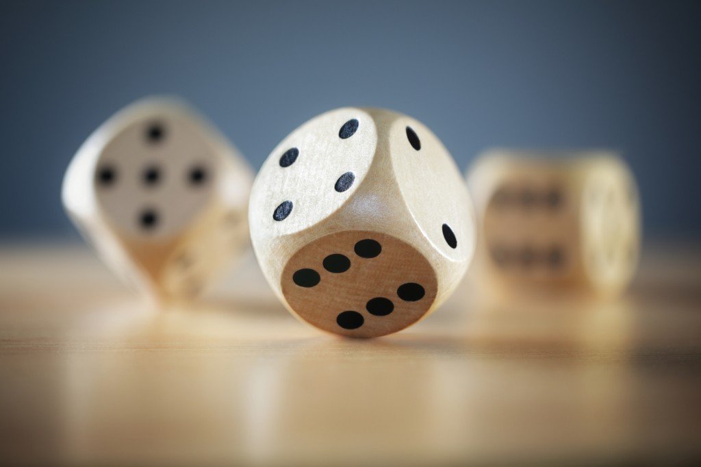 Dice rolling on a table